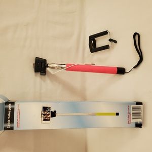 Camera stick for cell phone. Pink handle.